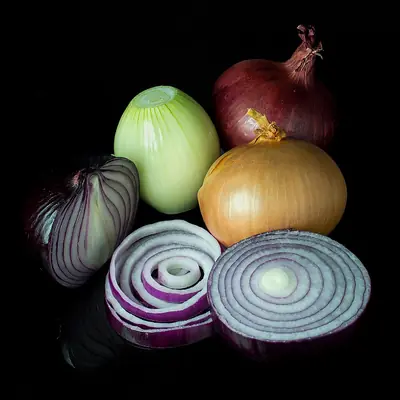 Red, white and brown onions together